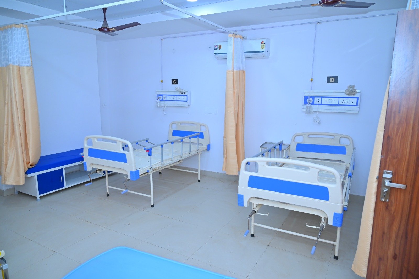 Orthopedic specialist examining a patient